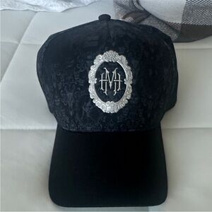 Disney Haunted Mansion Black Hat with grey wallpaper background